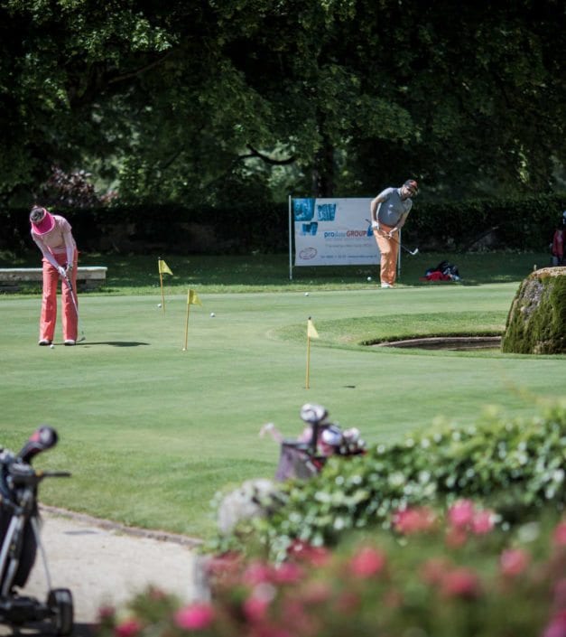 Joueurs golf practice Golf & Country Club Château de Bonmont